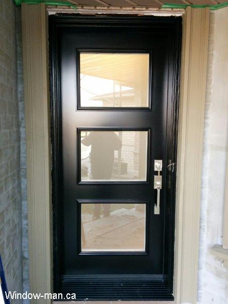 Single entry steel insulated black modern front door installation. Stylish shaker black popular style. Three lite Acid etched glass. Dorothy retro collection